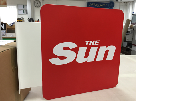 The Sun projecting signage